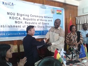 The Korean Ambassador, Woon-Ki Lyeo, shaking hands with Health Minister Dr Kwaku Agyeman-Mensah after signing the MOU.