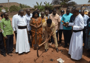 The Mayor breaking the ground.