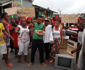 Some of the residents carrying meat products gone bad and damaged electronics items.