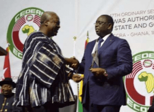 President Mahama handing over to President Sall