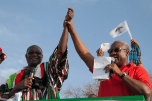 B.T. Baba (left) being introduced by President John Mahama