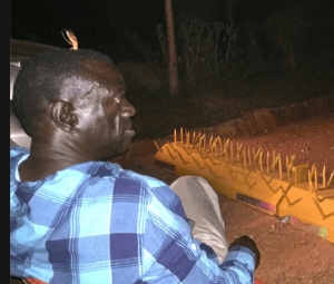 Kizza Besigye - dropped in front of his residence by the police.