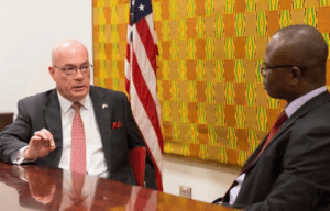 Ambassador Robert P. Jackson (left) during the interview