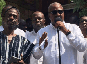 Mahama surrounded by party executives during the briefing.