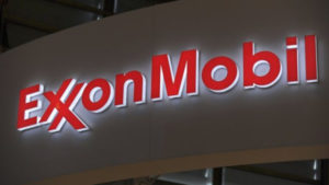 Oil giant Exxon announces major write-offs and job cuts