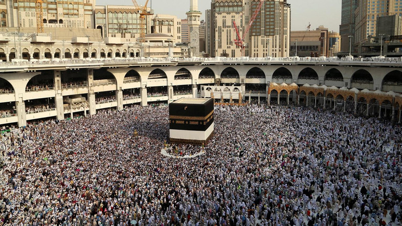 Muslim pilgrims circle the Kaaba at the Grand mosque in Mecca, Saudi Arabia