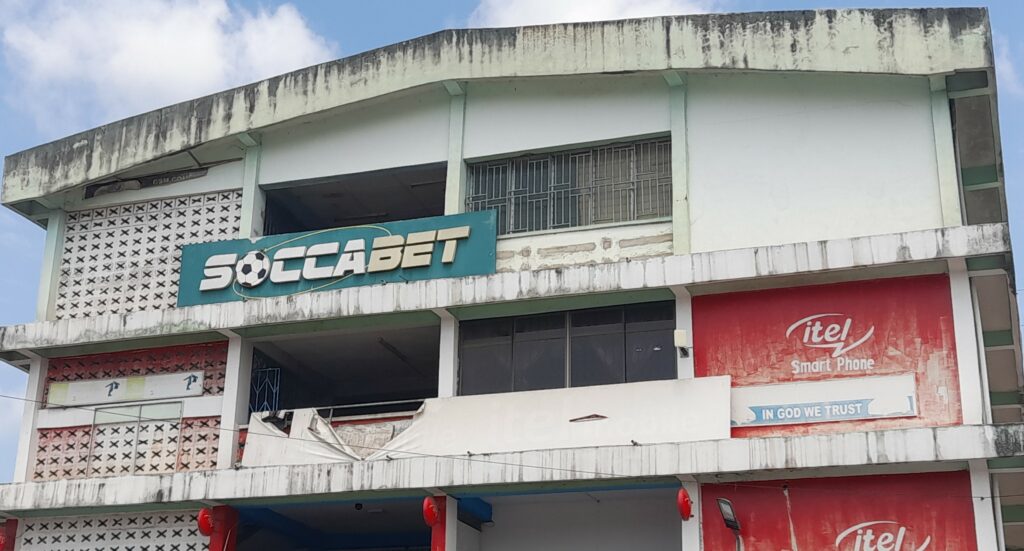 Soccabet display on a commercial building in Koforidua 