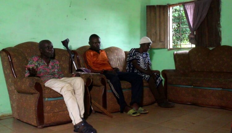 the village chief ( in white pants) with his advisors