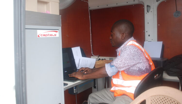 A weigbridge official at work